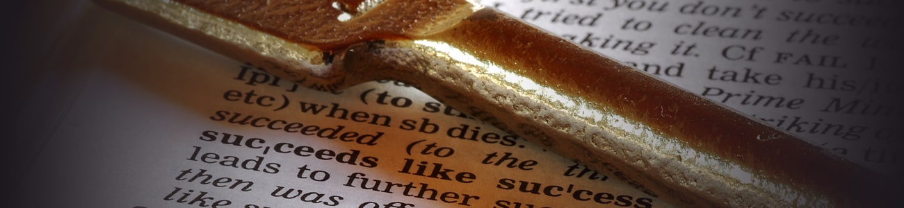 Banner picture of a key over an open book
