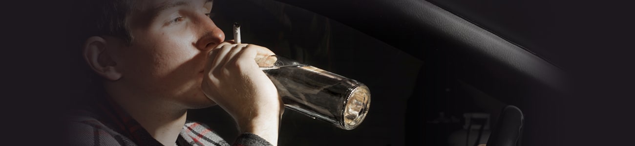 Banner picture of teen drinking inside a car